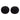 Set of (2) 10" Round Accent Pillows in Black Faux Sheepskin
